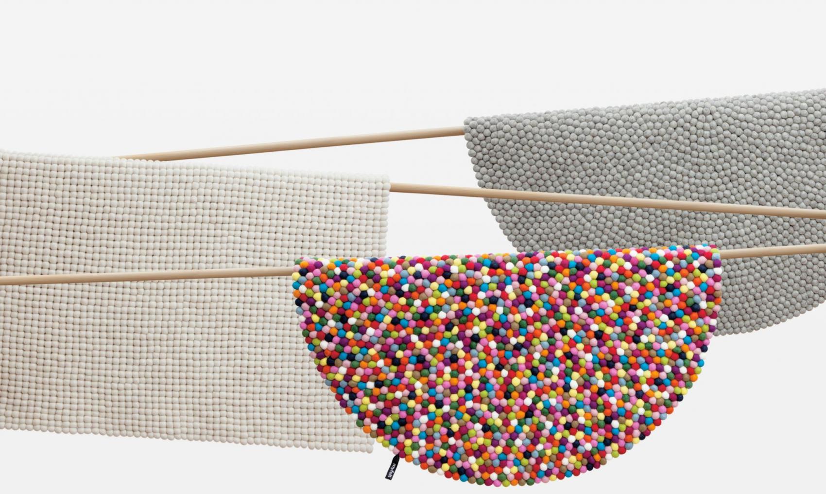 Handcrafted felt-ball carpets cover image